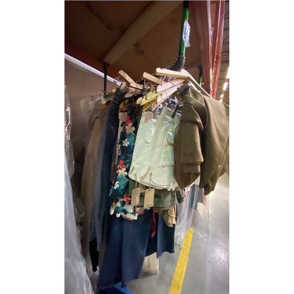 ONE RACK OF ASSORTED CLOTHING AND CURTAINS (MOSTLY CURTAINS) *RACK NOT INCLUDED*