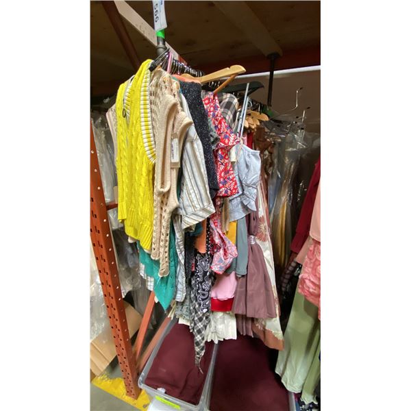 ONE RACK OF ASSORTED CLOTHING AND CURTAINS (MOSTLY CURTAINS) *RACK NOT INCLUDED*