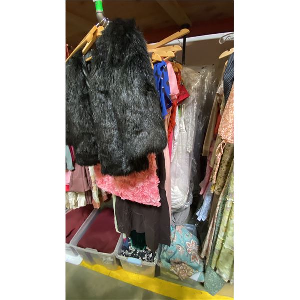 ONE RACK OF ASSORTED CLOTHING AND CURTAINS (MOSTLY CURTAINS) *RACK NOT INCLUDED*