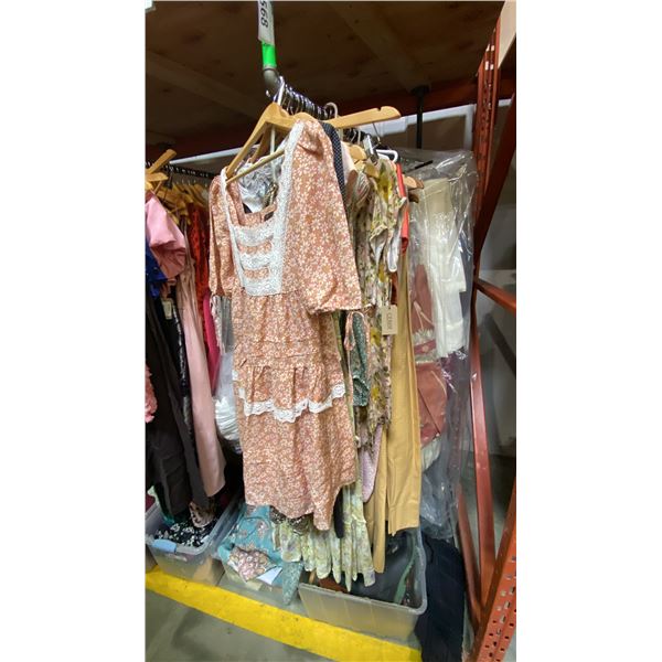 ONE RACK OF ASSORTED CLOTHING AND CURTAINS ) *RACK NOT INCLUDED*