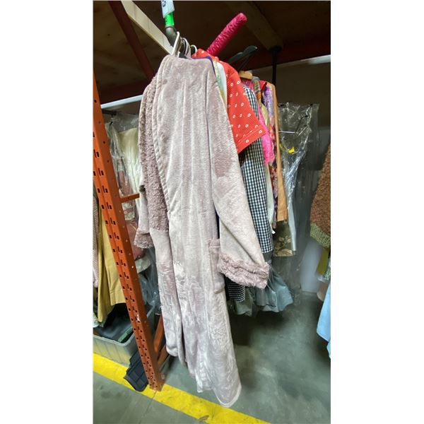 ONE RACK OF ASSORTED CLOTHING AND CURTAINS (MOSTLY CURTAINS) *RACK NOT INCLUDED*
