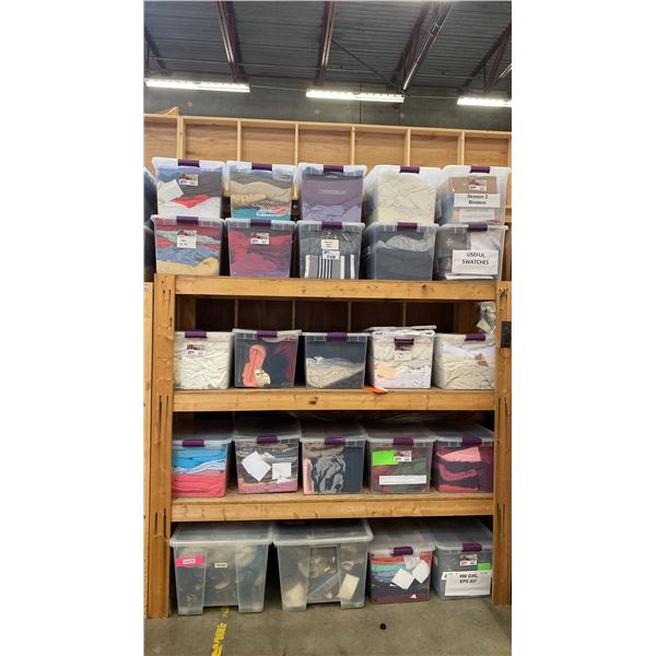 GROUP OF 25 PLASTIC STORAGE BINS FULL OF ASSORTED FABRIC MATERIAL AND 4 ROLLS OF FABRIC
