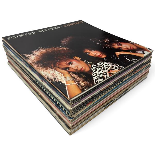 Collection of Vinyl Records Featuring Various Artists