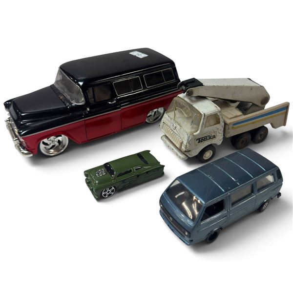 Diecast Toy Lot: Tonka Truck, VW Caravelle by Schabak, Chevrolet Suburban by Jada