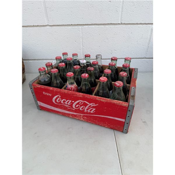 Vintage Coca-Cola bottles and crate