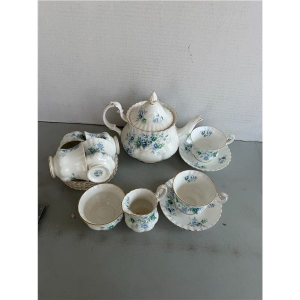 Royal Albert dishes, tea pot is chipped pieces in creamer dish