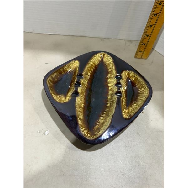 vintage mid-century modern ceramic ashtray featuring a rich dark brown and mustard yellow drip glaze