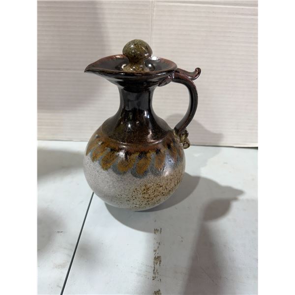vintage hand-crafted studio pottery pitcher features a striking dark brown and rust drip glaze patte