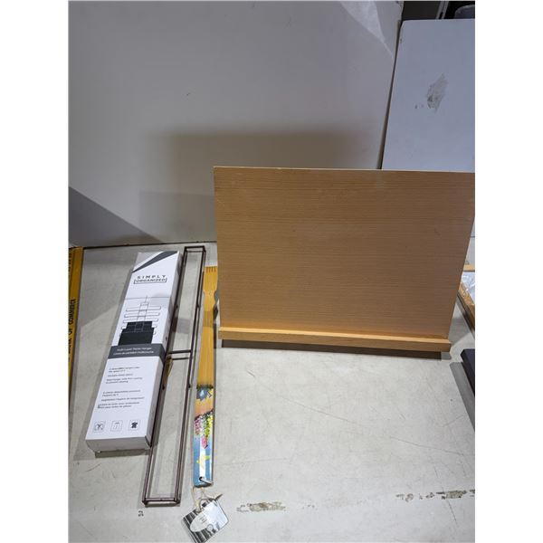 Pant hanger, back scratcher, laptop, or keyboard stand