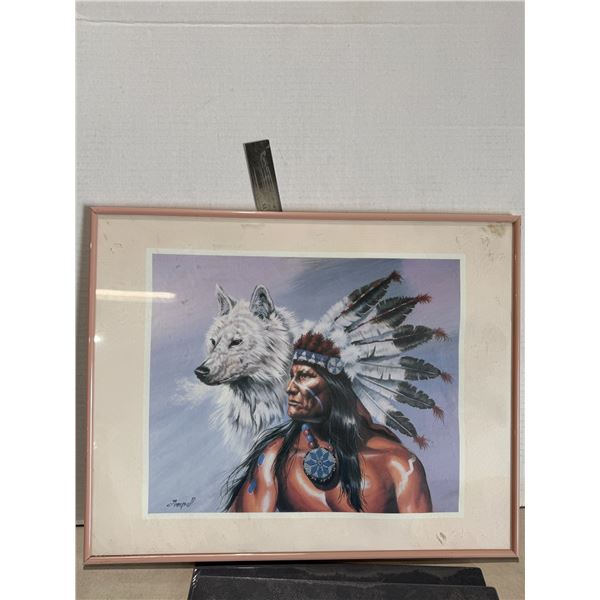 Native American chief in a feathered headdress alongside a white wolf art