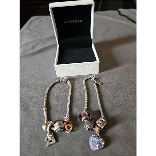 2 Pandora bracelets with charms