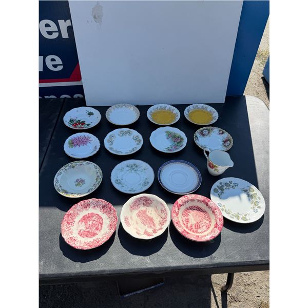 Assorted collectible dishes and saucers