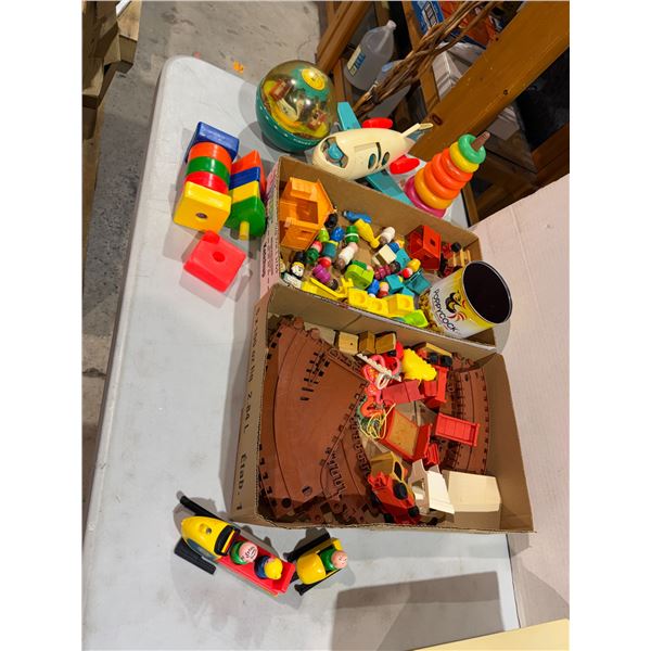 Assorted vintage Fisher-Price toys