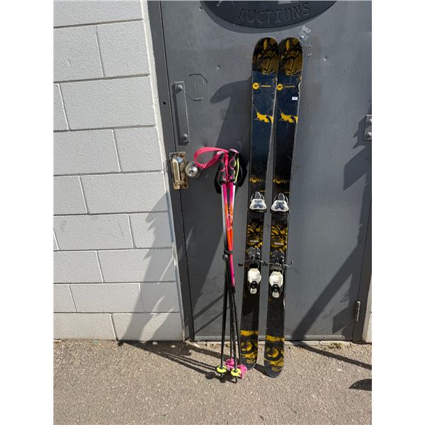 ROSSIGNOL skis with ski poles