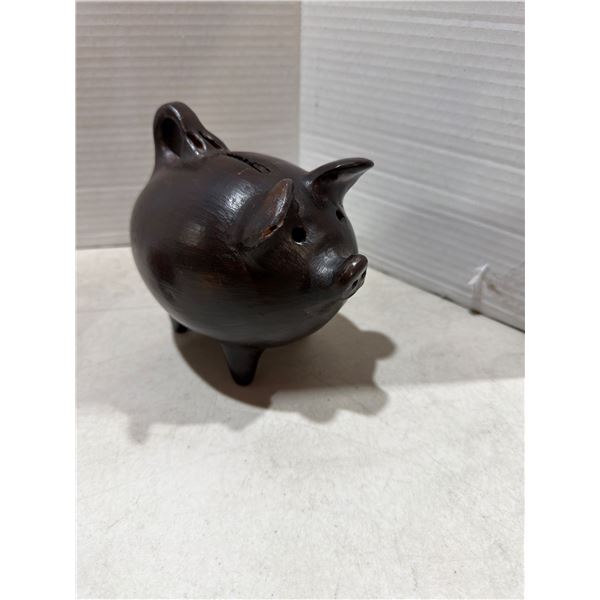 Small pottery pig coin bank