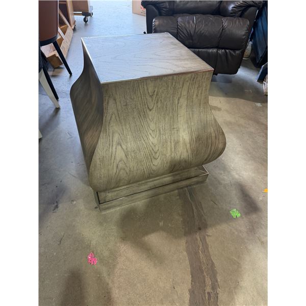 Accent table widest point is 25 inches and approximately 27 inches tall