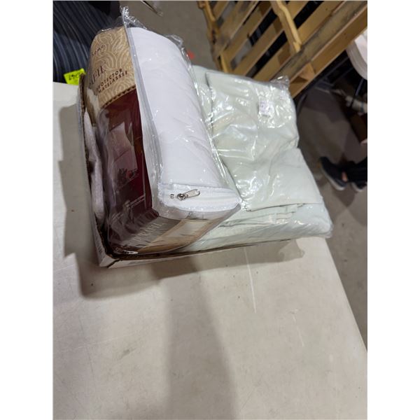 Assorted sheets and pillow protectors