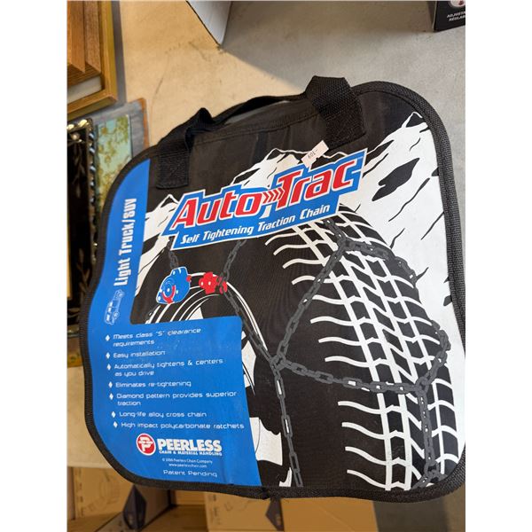 Self tightening traction chains