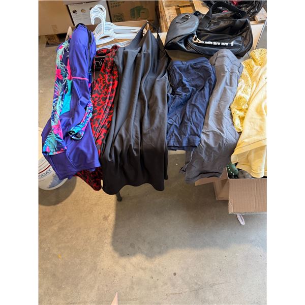 Assorted clothing and duffel bag