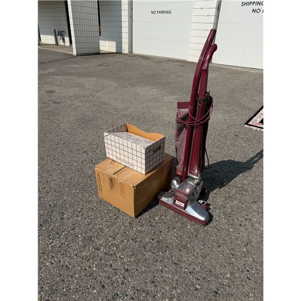 Kirby vacuum with a bunch of accessories M