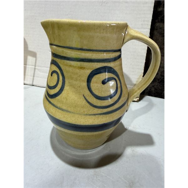 Studio pottery pitcher with chop Mark