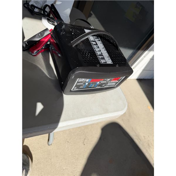 MotoMaster Eliminator Battery Charger. Powers on. Untested
