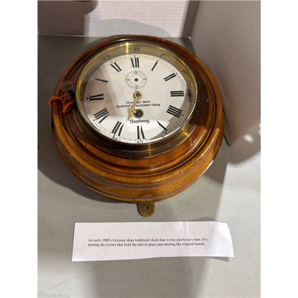 Antique German ships bulkhead Clock. Works but needs hands and face screws.