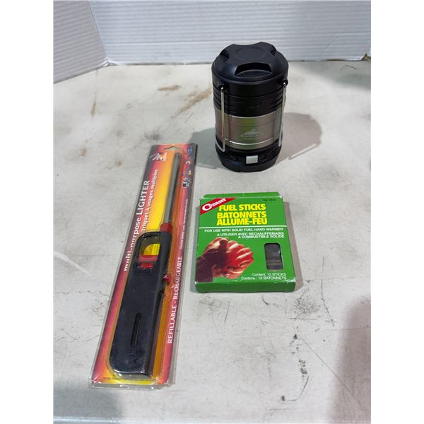 Lighter fuel, sticks and lantern