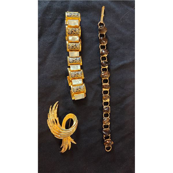 2 bracelets and a brooch