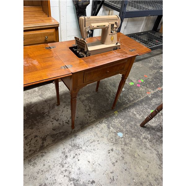 Singer, sewing machine in cabinet