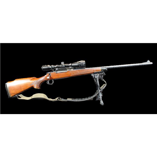 Remington Model 700 Bolt Action Rifle- 7 Mag- 24" Barrel- Bipod- Sling- Checkered- Center Point 3X9
