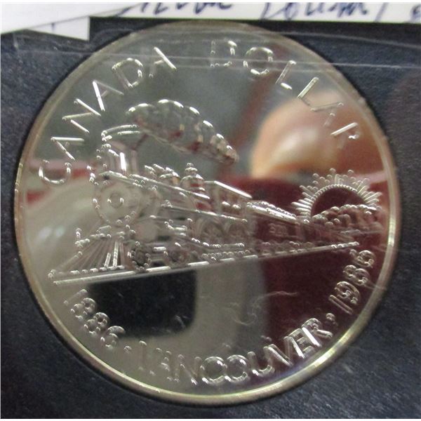 1986 PROOF CASED CANADA SILVER TRAIN DOLLAR