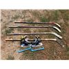 Image 1 : BAUER TUUK HOCKEY SKATES - SIZE BOYS 7D; AND HOCKEY STICKS
