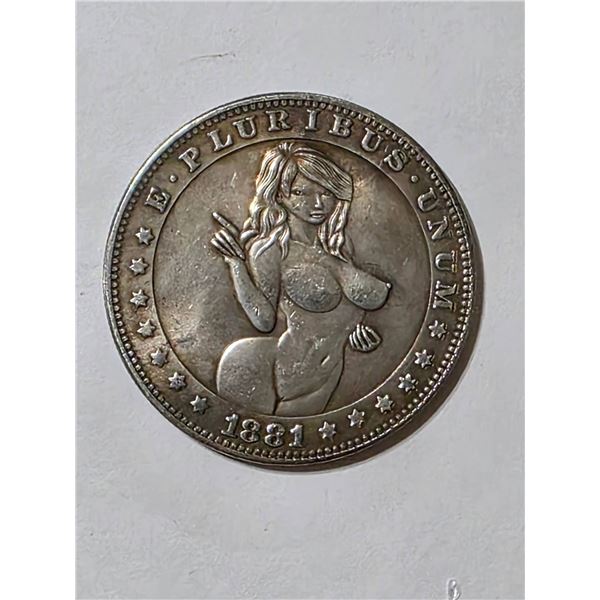 FANTASY CARVING ON REPLICA 1881-CC MORGAN DOLLAR