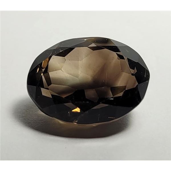 15)  NATURAL OVAL 28 CT SMOKEY