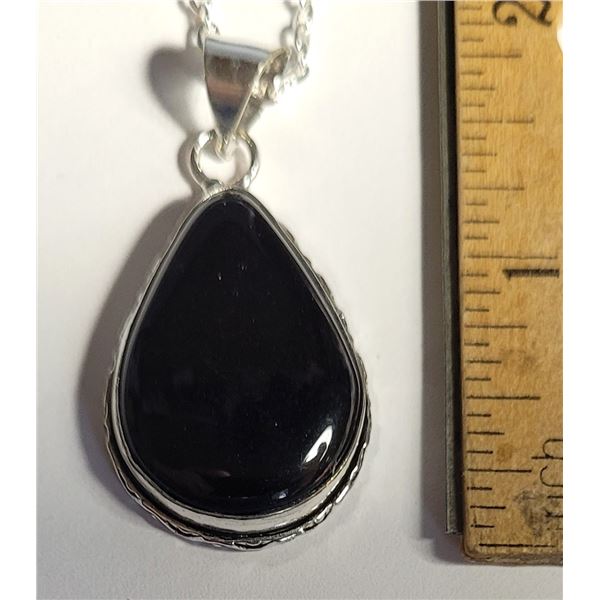 9)  PEAR SHAPED BLACK ONYX PENDANT