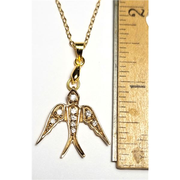 7)  GOLD TONE WITH CLEAR CZ DOVE