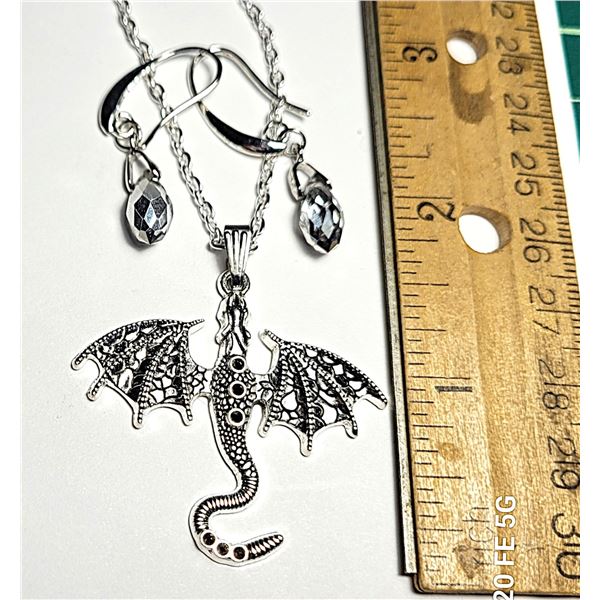 8)  SILVER TONE DRAGON PENDANT ON