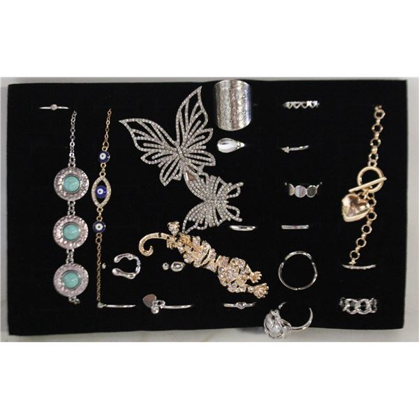 TRAY W/ BROOCH AND BRACELETS AND RINGS
