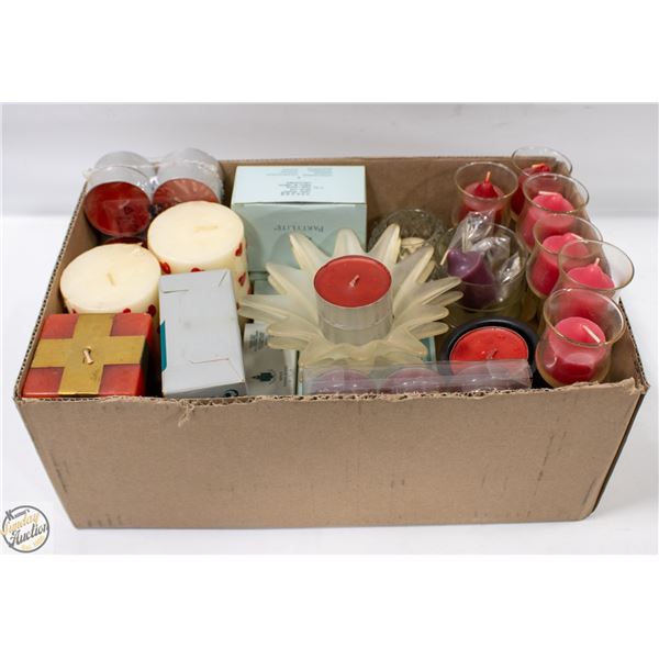 BOX OF CANDLES AND CANDLE HOLDERS