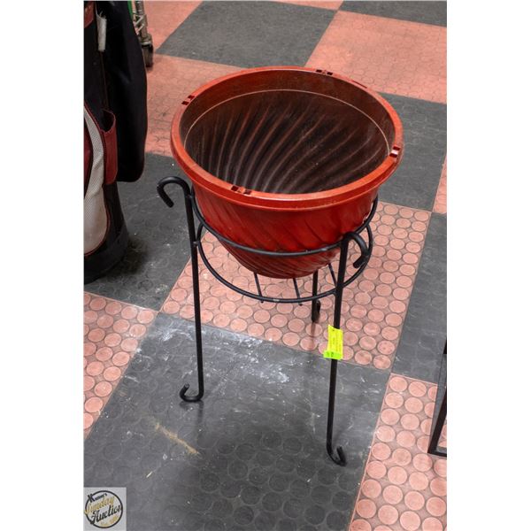 DECORATIVE METAL PLANT STAND WITH RED POT