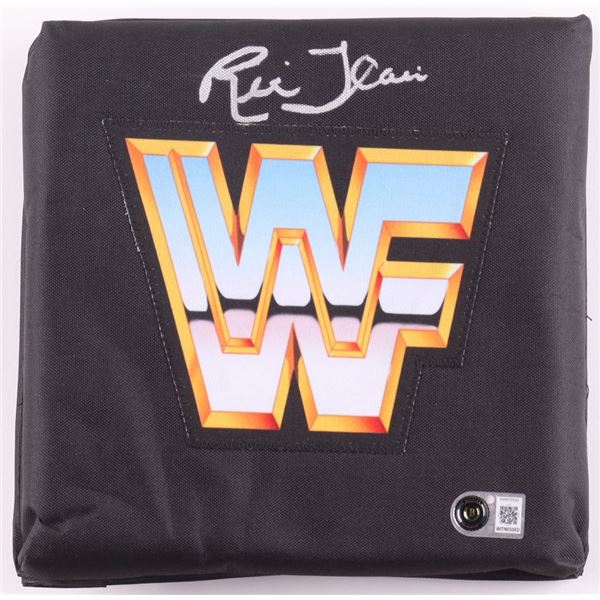 RIC FLAIR SIGNED WWF TURN BUCKLE - BECKETT COA