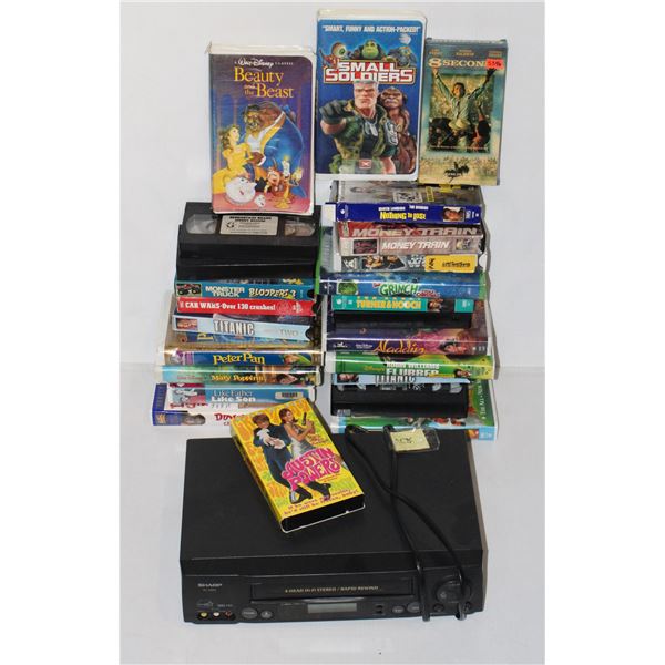TOTE OF VHS TAPES WITH VCR