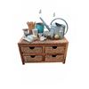 Image 1 : Rustic Wicker Drawer Cabinet With Garden Decor and Books