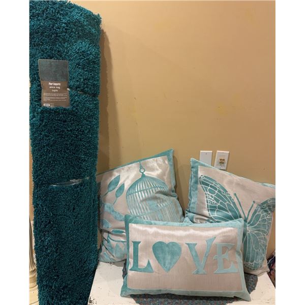 Three Decorative Teal Throw Pillows and Shag Area Rug