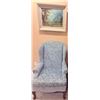 Image 1 : Upholstered Wingback Armchair with Damask Pattern and Framed Mountain Landscape Print