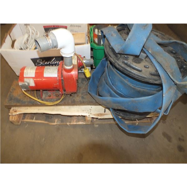 Roll Of Water Hose & Red Lion Water Pump