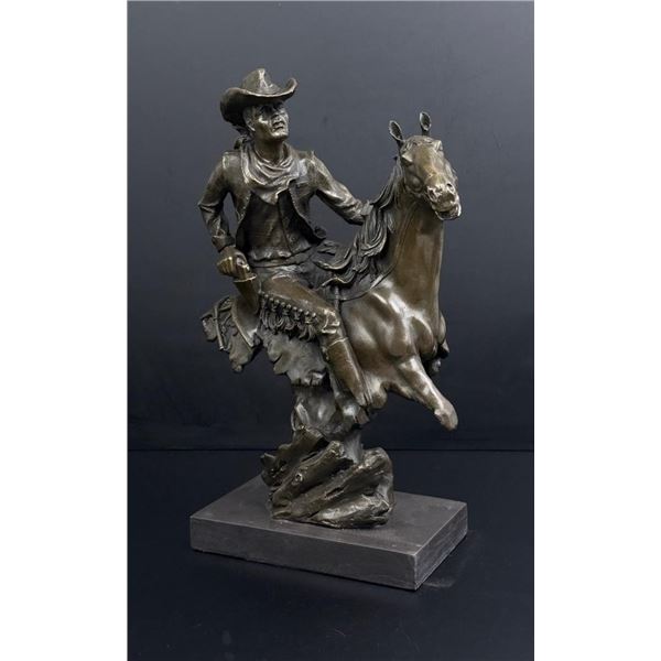 Armed Cowboy on Horseback Bronze