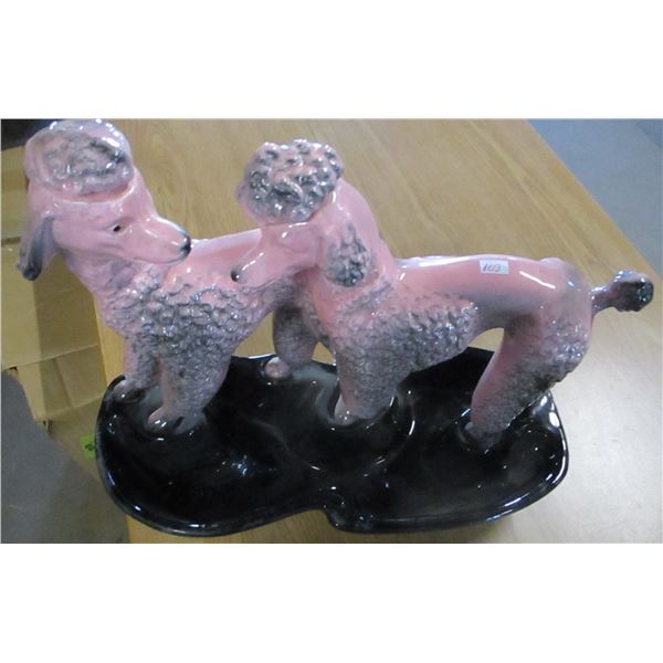 STATUE OF 2 DOGS