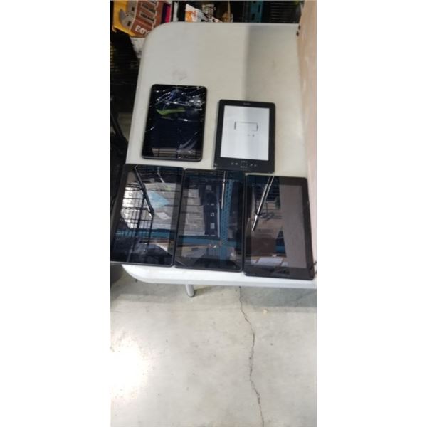 4 AMAZON TABLETS AND 1 KINDLE E READER. CONDITION UNKNOWN